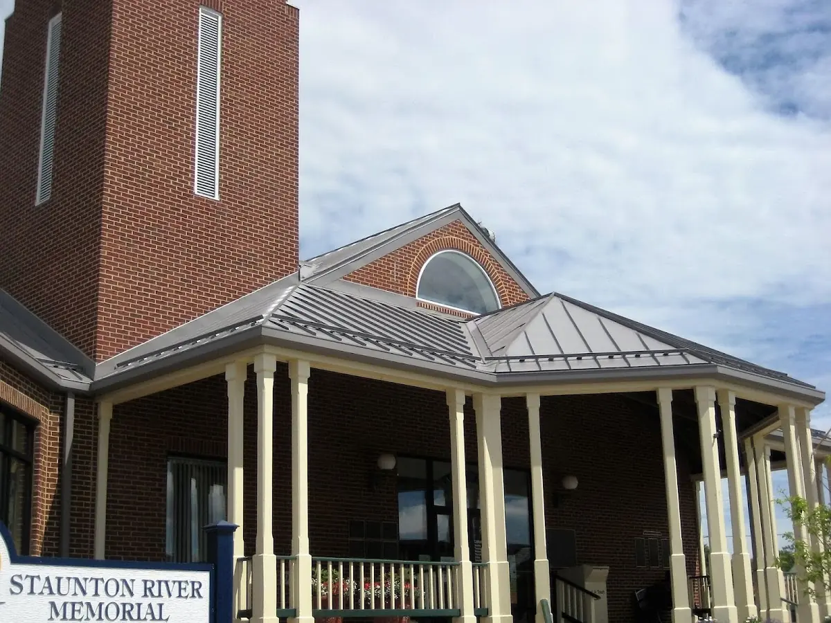 Skilled roofing craftsmen working on a residential roof in Downtown Frederick